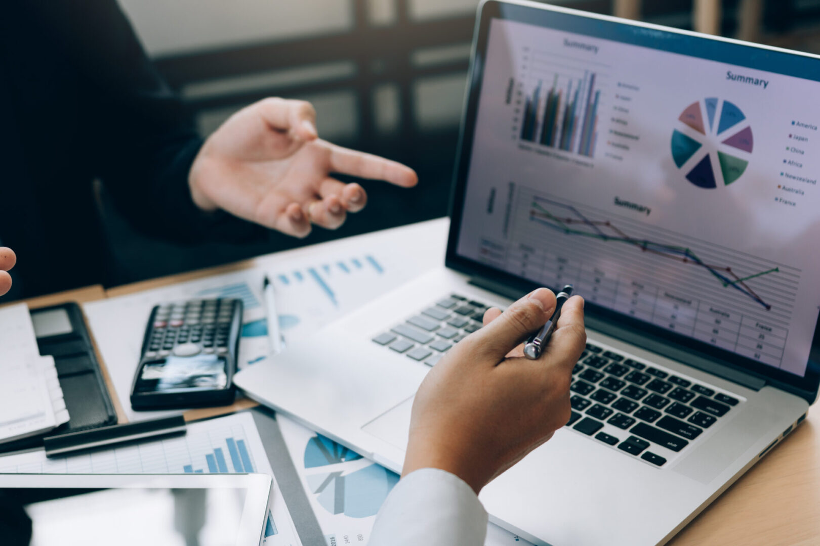 Business people reviewing financial data.